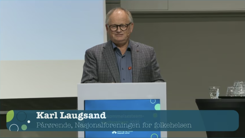 Mann som holder foredrag